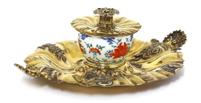 Lot 913 - A Japanese Kakiemon and English Rococo Revival silver-gilt mounted inkstand