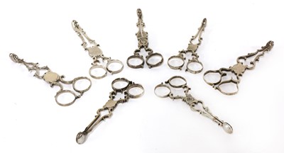 Lot 823 - Three pairs of silver scissor-action sugar nips