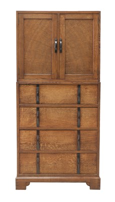 Lot 88 - A Gordon Russell oak two-part cabinet and chest