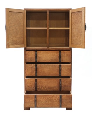 Lot 88 - A Gordon Russell oak two-part cabinet and chest