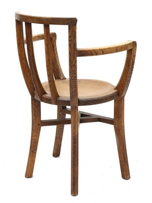 Lot 91 - An Arts and Crafts oak armchair
