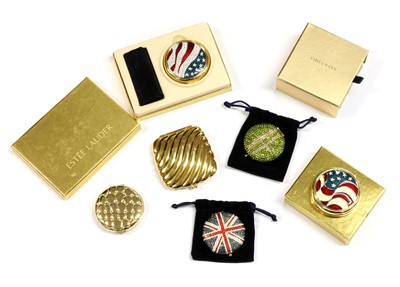 Lot 422 - A collection of Estee Lauder compacts