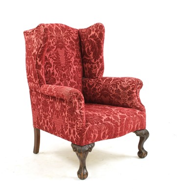 Lot 347 - A George III style mahogany framed wingback armchair