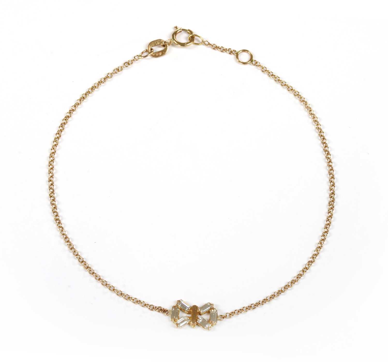 Lot 163 - An 18ct gold diamond bow bracelet