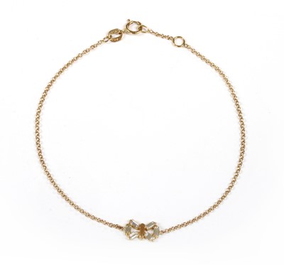 Lot 163 - An 18ct gold diamond bow bracelet