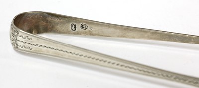 Lot 67 - A pair of Irish silver sugar tongs