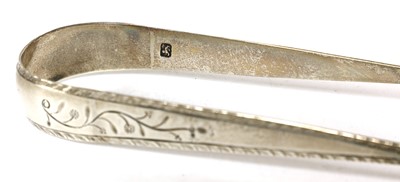 Lot 827 - A pair of George III silver sugar tongs