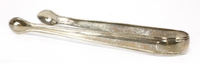 Lot 827 - A pair of George III silver sugar tongs