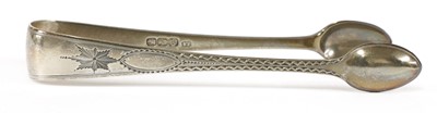 Lot 824 - A pair of George IV Scottish silver Old English pattern sugar tongs