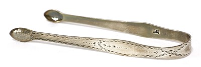Lot 824 - A pair of George IV Scottish silver Old English pattern sugar tongs