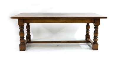 Lot 315 - An oak refectory table