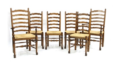 Lot 320 - A set of six 18th century style oak ladder back dining chairs