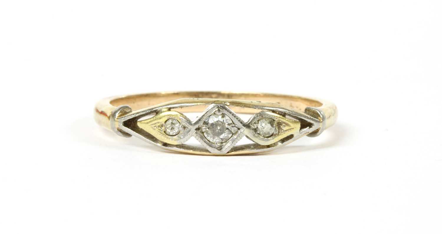 Lot 156 - A gold three stone diamond ring