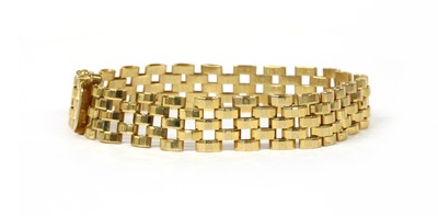 Lot 56 - A 9ct gold three row faceted panther link bracelet