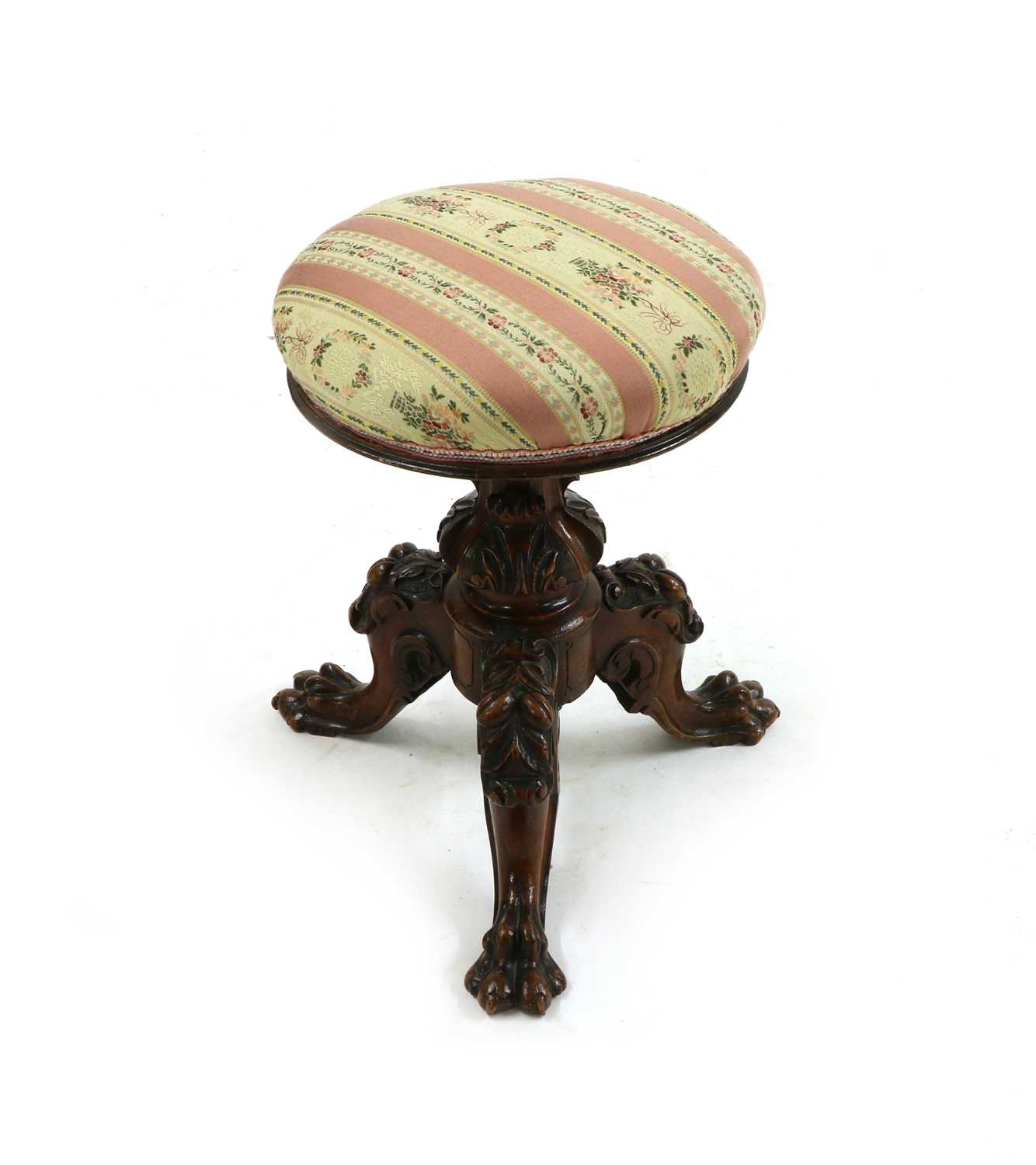Lot 223 - A Victorian carved walnut piano stool