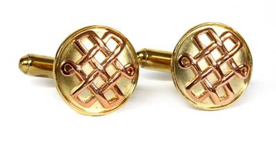 Lot 447 - A pair of Welsh 9ct yellow and rose gold cufflinks, by Clogau