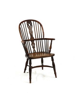 Lot 243 - A late 18th/early 19th century yewood and elm Windsor elbow chair
