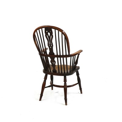 Lot 243 - A late 18th/early 19th century yewood and elm Windsor elbow chair