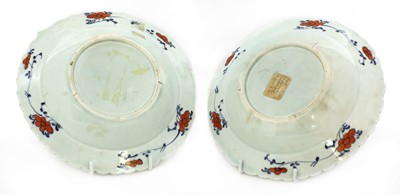 Lot 273 - A pair of English pottery 'tobacco leaf' dishes
