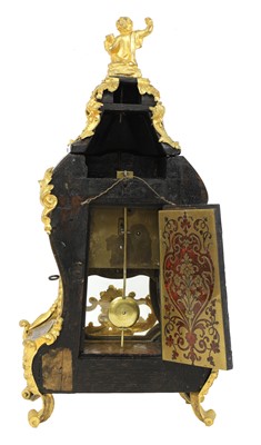 Lot 233 - A French Louis XV tortoiseshell, brass and ormolu-mounted bracket clock