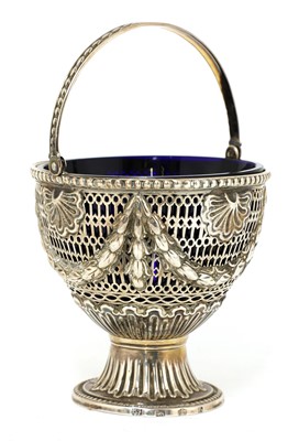 Lot 818 - A George III silver sugar basket