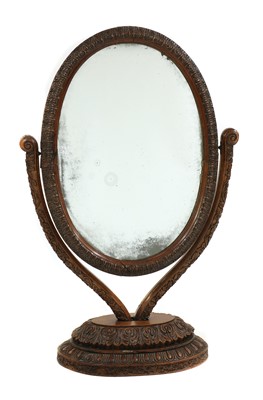 Lot 393 - An Anglo-Indian carved padouk or rosewood dressing mirror