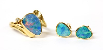 Lot 327 - A 14ct gold opal and diamond ring