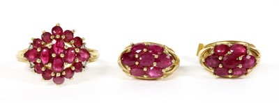 Lot 122 - A 9ct gold ruby and diamond cluster ring