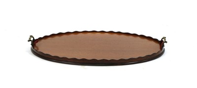 Lot 221 - A George III mahogany oval tray