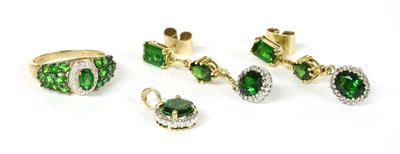 Lot 310 - A pair of gold chrome diopside and diamond drop earrings