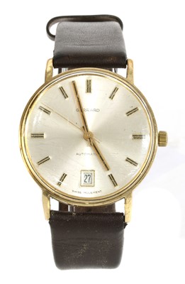 Lot 485 - A gentlemen's 9ct gold Garrard automatic strap watch, c.1980