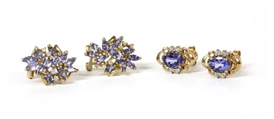 Lot 402 - A pair of 9ct gold tanzanite and diamond cluster earrings
