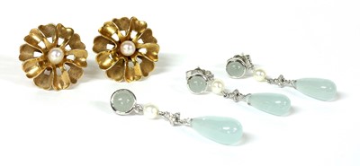 Lot 396 - A pair of gold single stone pearl earrings
