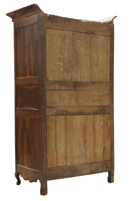 Lot 54 - A French fruitwood cupboard