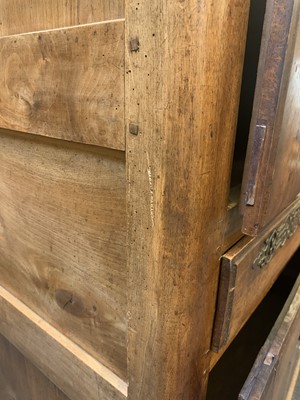 Lot 54 - A French fruitwood cupboard