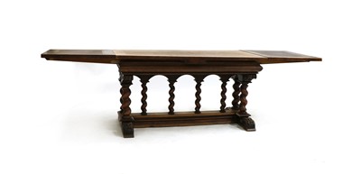 Lot 300 - A 19th century oak draw leaf table