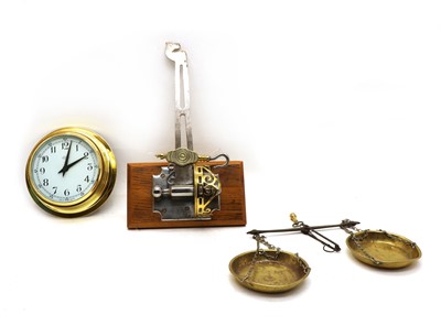 Lot 150 - A brass cased ships clock