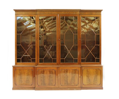 Lot 239 - A Georgian design mahogany breakfront bookcase