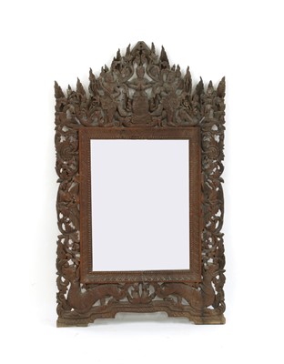 Lot 251 - A Burmese hardwood mirror