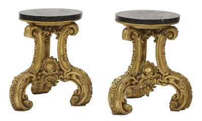 Lot 282 - A pair of ornately carved giltwood stands