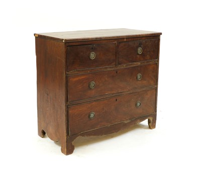 Lot 282 - A small mahogany chest of two short and two long drawers