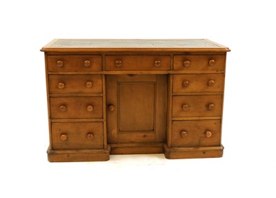 Lot 241 - A Victorian stripped pine kneehole desk