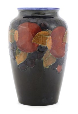 Lot 210 - A William Moorcroft 'Pomegranate' urn