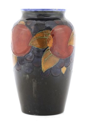 Lot 210 - A William Moorcroft 'Pomegranate' urn