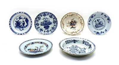 Lot 144 - Delftware, four English delftware plates