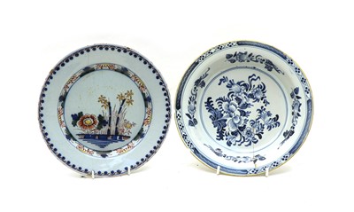 Lot 144 - Delftware, four English delftware plates