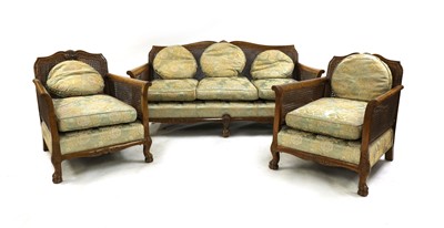 Lot 236 - A 1930's bergere three piece suite
