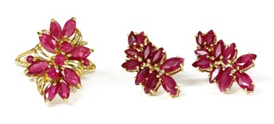 Lot 128 - A 9ct gold ruby and diamond cluster ring