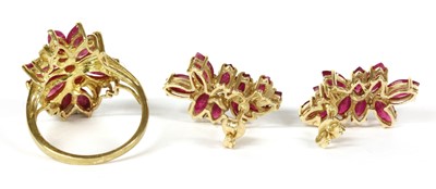 Lot 128 - A 9ct gold ruby and diamond cluster ring