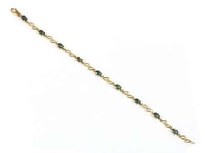 Lot 308 - An 18ct gold feldspar and diamond bracelet